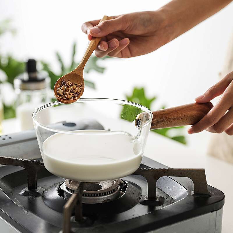Household transparent glass milk pot, high borosilicate glass wooden handle small milk pot, instant noodle pot, household soup pot, salad pot details Picture