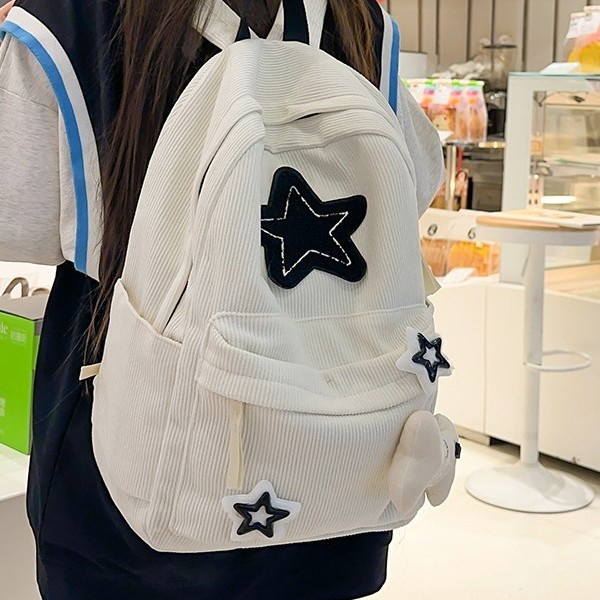 The new schoolbag is cute with star-shaped bones. It has a high appearance level and a niche design sense. It is a lightweight backpack and a school backpack for middle school students details Picture