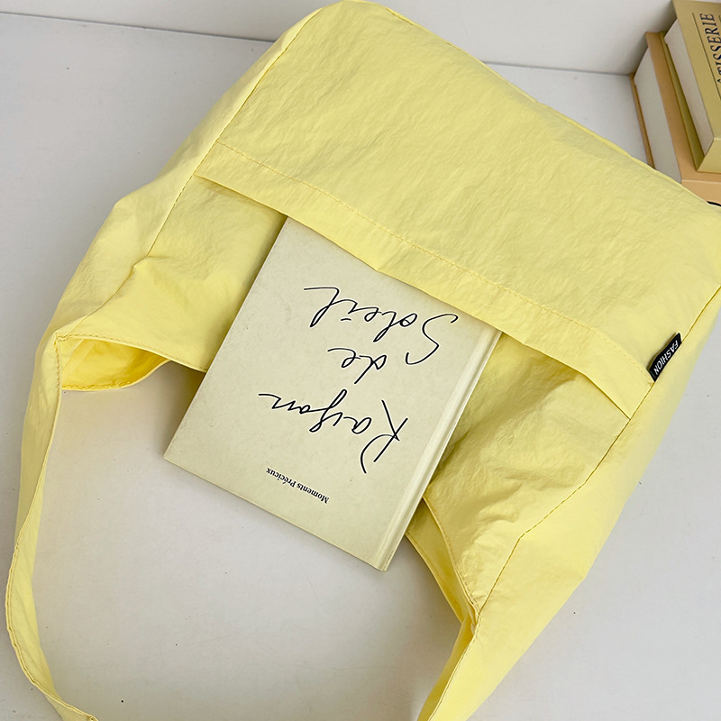 New solid-color versatile single-shoulder bag, simple and elegant college student dumpling bag, casual and durable, high appearance level, ins underarm bag for women Application Scenario