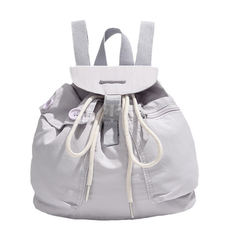 2024 New Korean ins women's niche design lightweight pocket button drawstring backpack with multiple pockets Item Picture