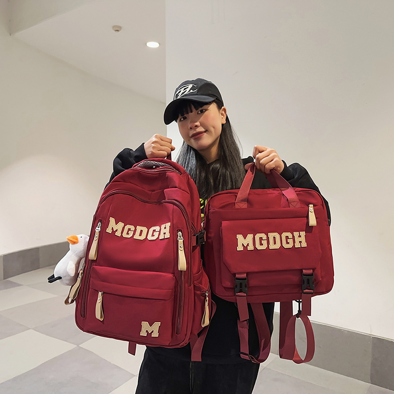 A high-appearation-level two-piece schoolbag set with a large capacity for both men and women, a simple letter and trendy backpack for both students details Picture