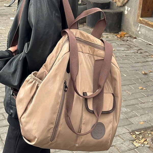The 2024 cross-border fashion large-capacity, versatile and multi-functional backpack is trendy and lightweight for traveling and going to school full figure