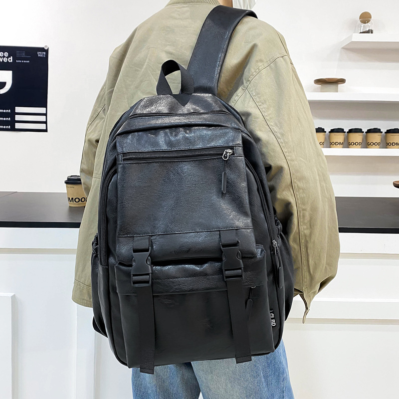 New large-capacity travel backpack for men, Korean-style college students, trendy and versatile solid color schoolbag, backpack and computer bag full figure
