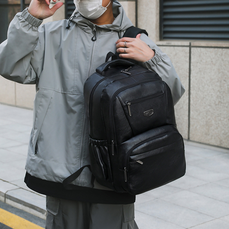 The manufacturer wholesals new men's and women's casual bags, large-capacity travel backpacks, Korean-style backpacks and college students' casual schoolbags details Picture