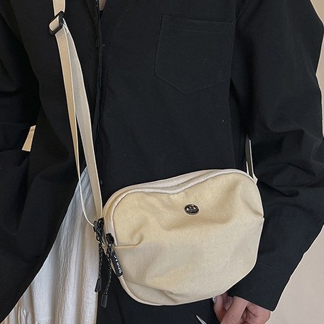 Ultra-light waterproof women's canvas crossbody bag with large capacity, layered design, light and casual, multi-color portable new crossbody details Picture