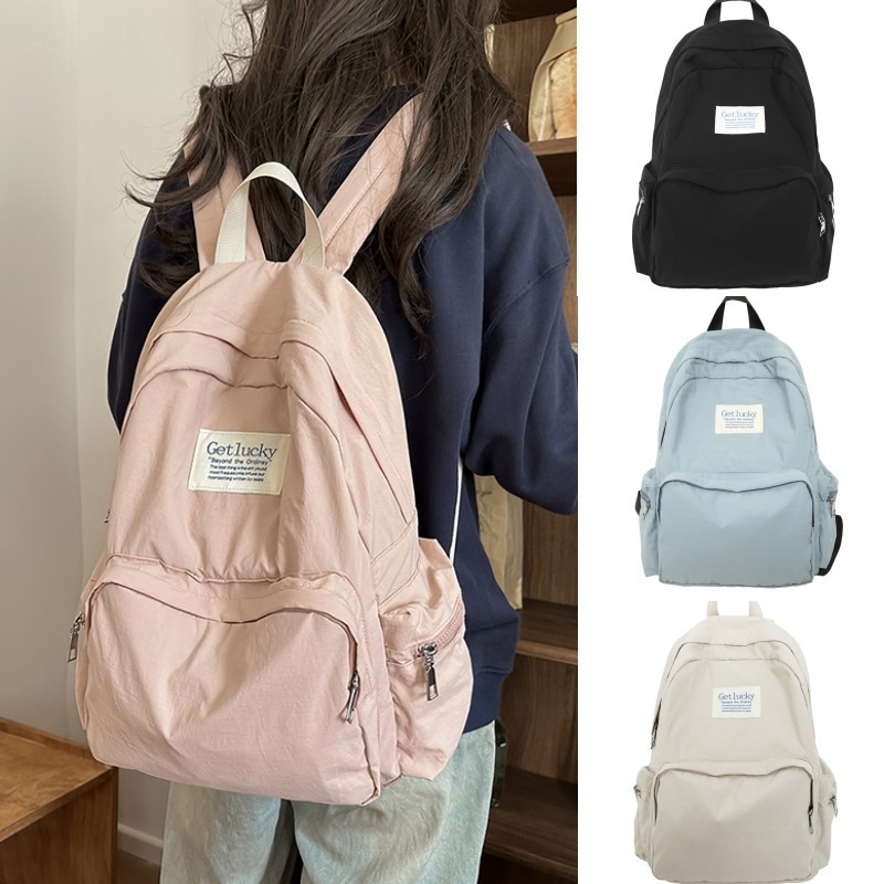 The 2025 new backpack for women's university birthday is a lightweight, casual, simple, waterproof and large-capacity travel backpack full figure