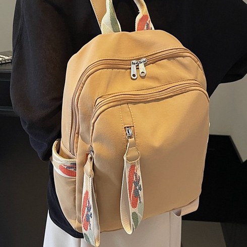 Fashionable new color-blocking fresh schoolbag bag, college-style solid color woven dirt-resistant backpack, large-capacity commuting backpack details Picture