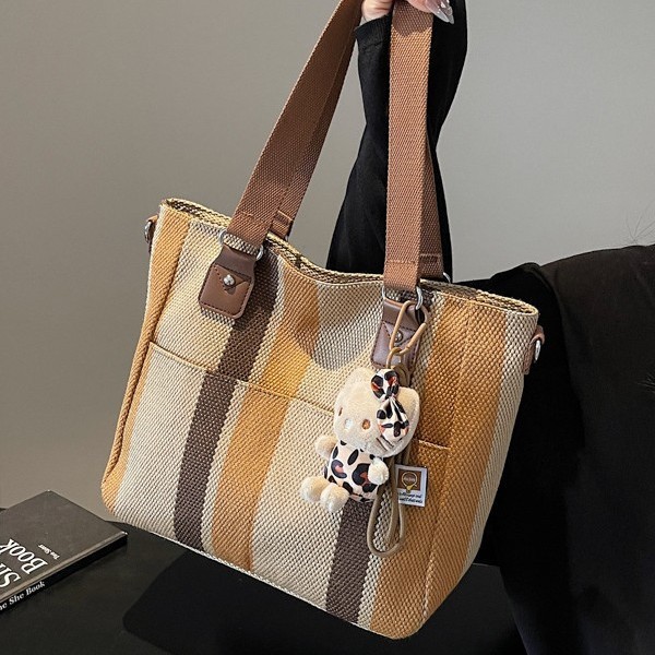 Women's large-capacity 2025 new women's bag, canvas, striped bag for college students, commuter tote bag, crossbody bag details Picture