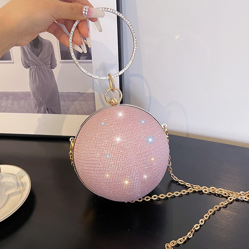 A niche design round ball bag for women, a new high-end hand-held crossbody chain small bag, a dinner bag, and a mini red envelope details Picture