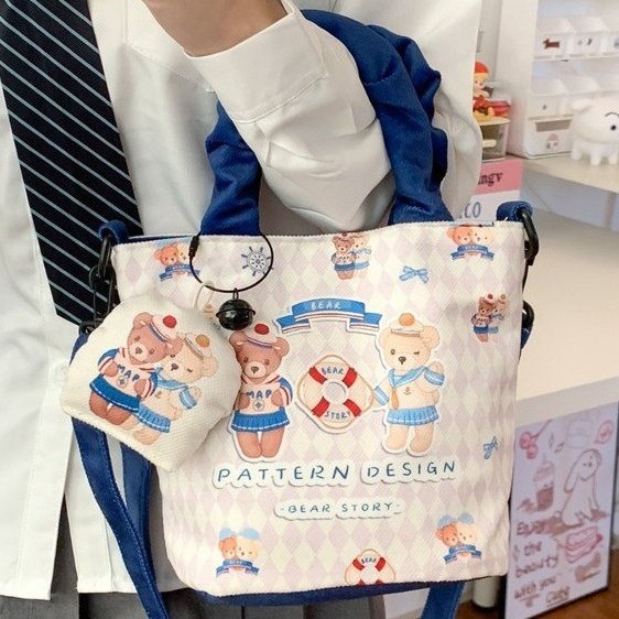 Canvas bag 2025 New cartoon-printed commuter small cloth bag, hand-held cloth bag, large-capacity casual bucket bag details Picture