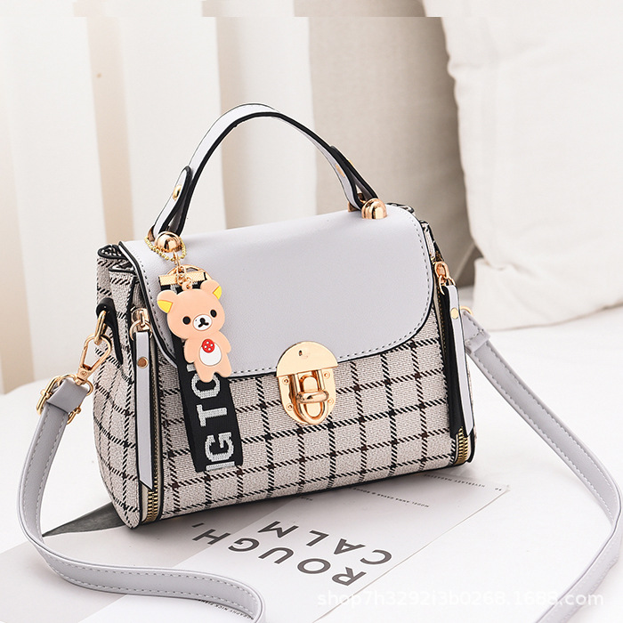 The 2024 new stylish checkered crossbody bag for women, a trendy Korean-style shoulder bag, is a super popular small square bag on Instagram details Picture