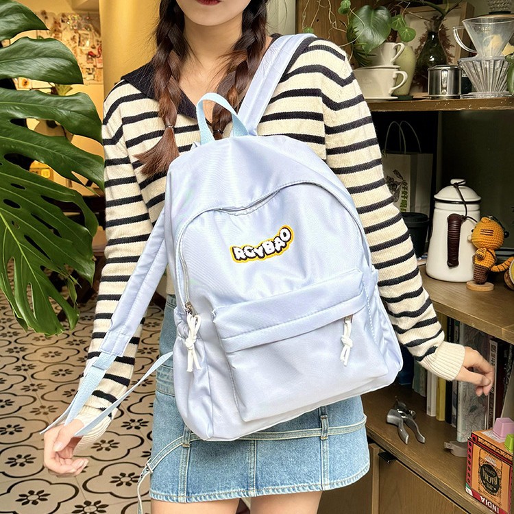 A cute and casual ultra-light backpack in macaron color for cross-border use in 2024. It's a versatile and lightweight casual backpack full figure