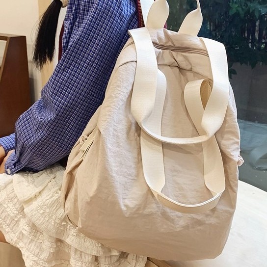 Japanese fashion trend large-capacity schoolbag, casual sports backpack, backpack for junior and senior high school students, solid-color backpack full figure