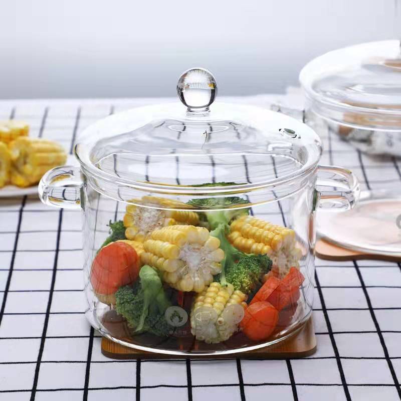 A large-capacity household glass instant noodle pot with a handle that can be heated by an electric ceramic stove for stewing soup with high borosilicate glass full figure
