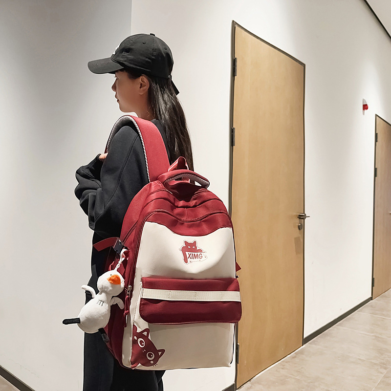 2025 color-blocking large-capacity student schoolbags, junior and senior high school backpacks, simple and Ins-style computer bags, and fashionable bags details Picture