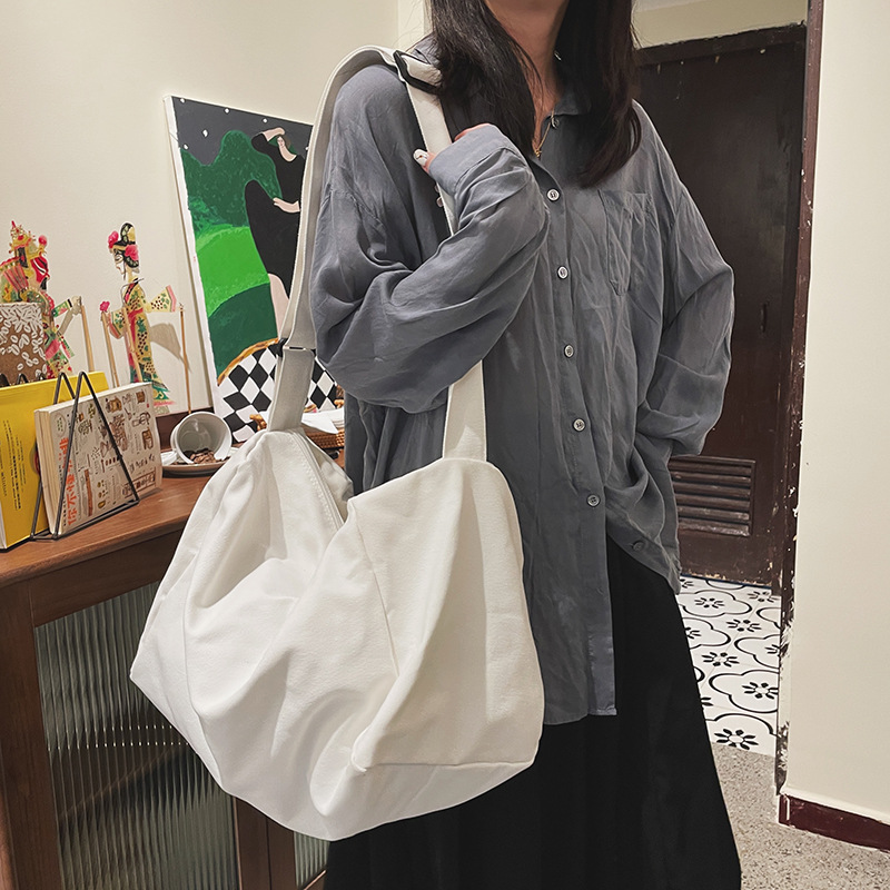 Solid color large-capacity canvas bag for women, 2021 new ins style simple single-shoulder crossbody bag, retro tote bag details Picture