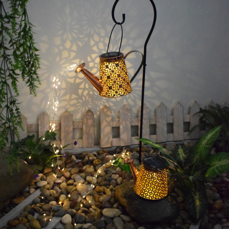 Ironwork hollowed-out projection lamp, solar outdoor waterproof courtyard garden water bottle lamp, lawn landscape ground insert decorative lamp details Picture