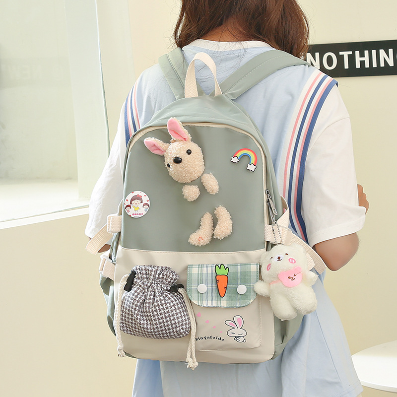 Fashionable and casual Korean-style backpack for girls, cute cartoon, lightweight schoolbag for primary school students, large-capacity, color-blocking trendy backpack Application Scenario