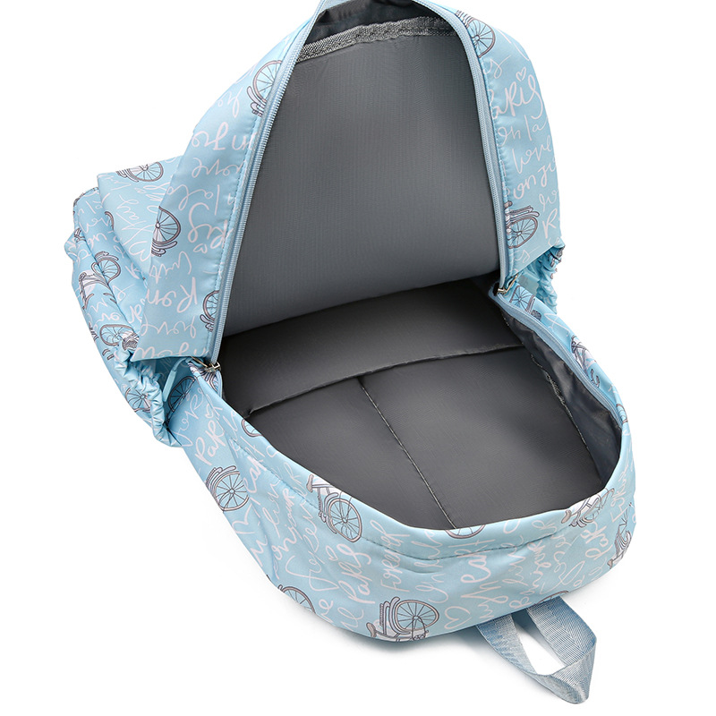 A new minimalist three-piece set for foreign trade, a large-capacity travel backpack, and a fashionable and versatile student bag for junior and senior high school students Item Picture