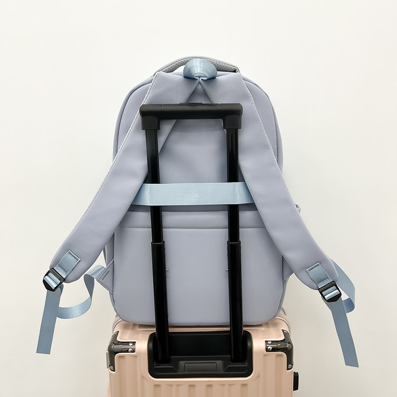 Large-capacity schoolbag for girls, simple and solid-color Japanese-style junior high school student backpack, wide shoulder strap backrest, casual backpack wholesale Application Scenario