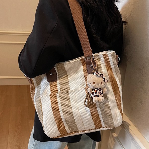 Women's large-capacity 2025 new women's bag, canvas, striped bag for college students, commuter tote bag, crossbody bag full figure
