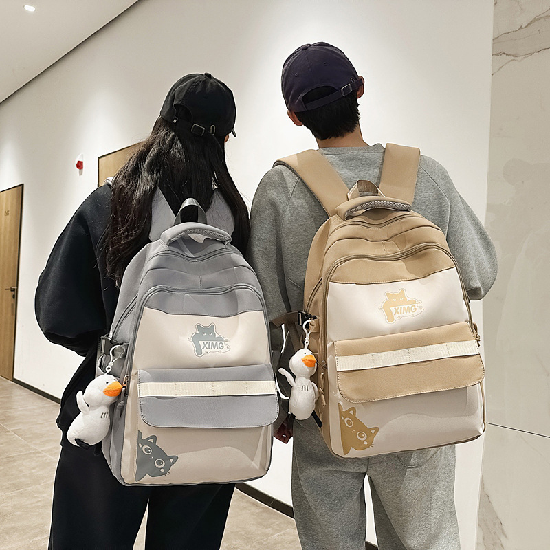 2025 color-blocking large-capacity student schoolbags, junior and senior high school backpacks, simple and Ins-style computer bags, and fashionable bags full figure