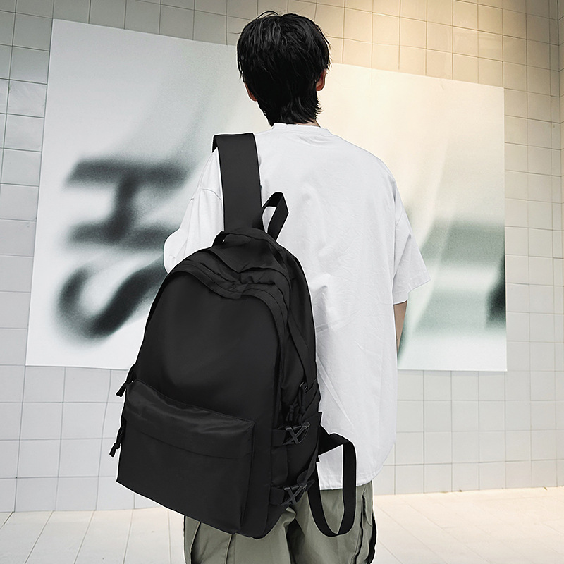 Wholesale new casual and simple backpacks, lightweight and versatile solid-color travel backpacks, suitable for both male and female middle school students details Picture