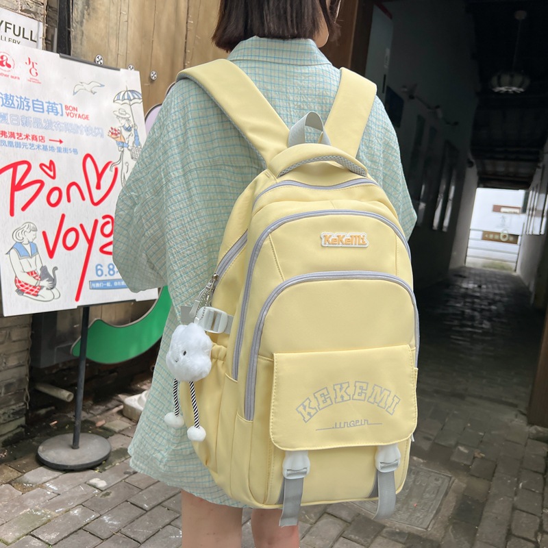 Japanese-style workwear solid-color backpacks, casual computer backpacks, large-capacity letter-printed schoolbags for girls in junior and senior high schools full figure