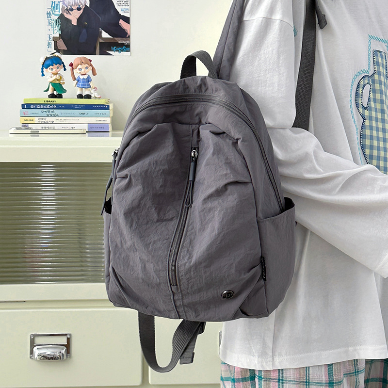New spring outing lightweight small backpack, women's casual shopping small backpack, men's student class iPad tablet bag full figure