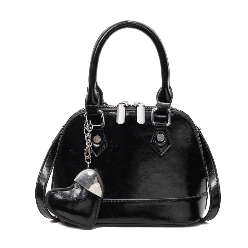 Stylish and fashionable hand-held shell bag for women, a new summer 2025 simple single-shoulder bag, a trendy and casual niche crossbody bag Item Picture