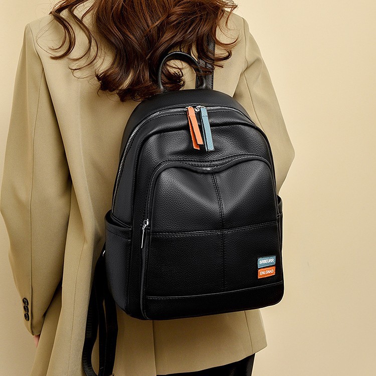Versatile 2024 Women's soft Fashion Backpack, large capacity, simple and casual backpack, commuting Light and travel schoolbag full figure