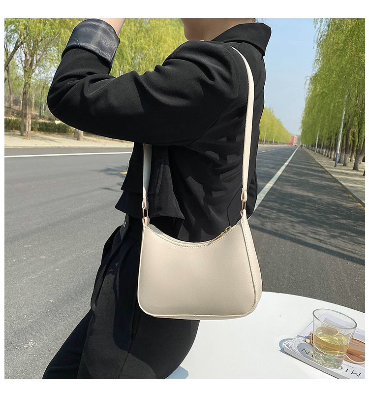 2022 Summer New Collection: Women's fashionable crossbody bag, simple underarm bag, solid-color crossbody bag, and niche dumpling bag for women details Picture