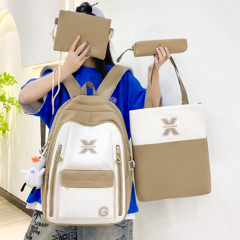 The new girls' schoolbag is versatile. It features a large-capacity campus backpack for junior high school students with contrasting colors and a lightweight tutorial backpack set of four pieces Specification drawing