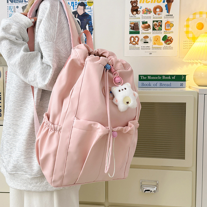 Trendy dopamine large-capacity backpack, cute drawstring opening, high appearance level for girls, versatile schoolbag, cute backpack Application Scenario