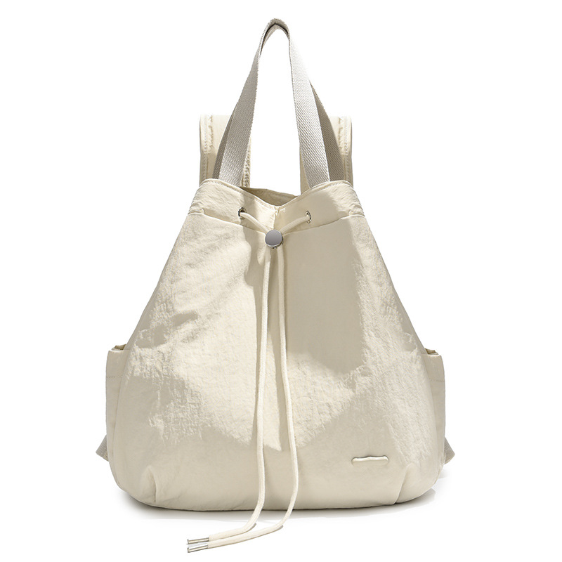 A new and fashionable Korean-style women's niche drawstring backpack with a large capacity and lightweight nylon commuting hand bag Item Picture