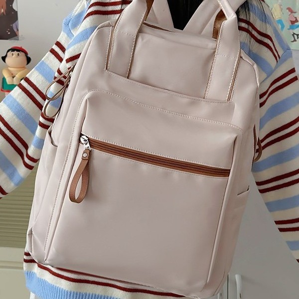 Japanese-style warm-colored commuter bags, large-capacity backpacks, backpacks, computer bags, men's and women's schoolbags, casual and fashionable travel bags full figure