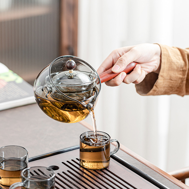 High borosilicate rotating free and easy teapot, tea-water separation transparent black glass teapot, detachable teapot, kung Fu tea set full figure