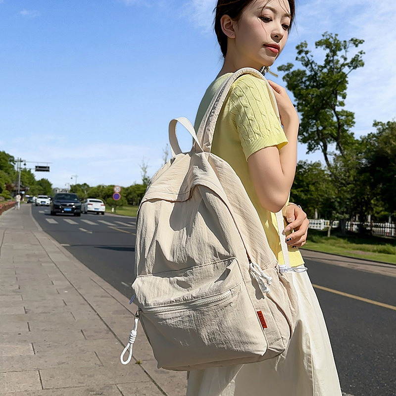 New ins Japanese-style solid-color backpacks for girls, junior high school students, college students, and travel lightweight backpacks full figure