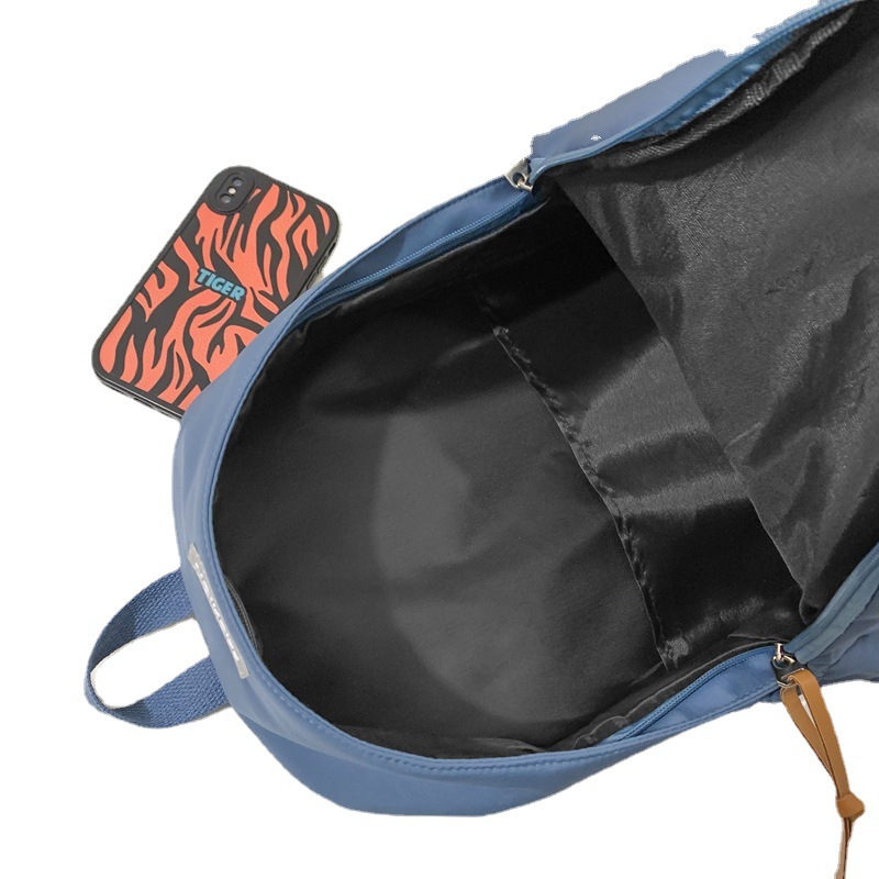 Wholesale of new solid-color backpacks, Korean version of ins schoolbags for junior high school, senior high school and college students, and large-capacity backpacks for leisure travel Item Picture