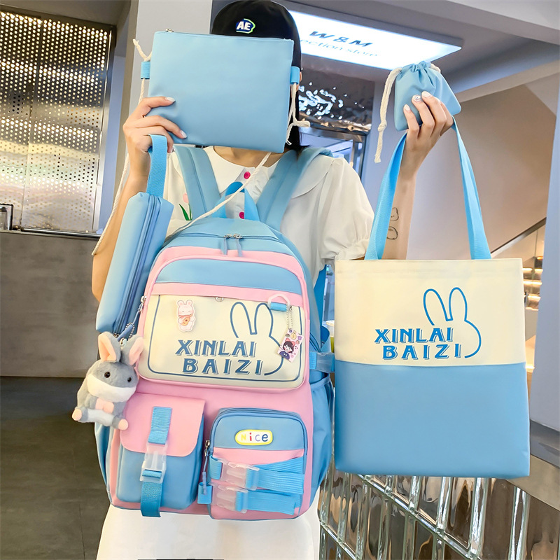 Wholesale fashionable color-blocked student schoolbags, five-piece sets, large-capacity Korean version backpacks, and women's cartoon casual backpacks from the manufacturer full figure