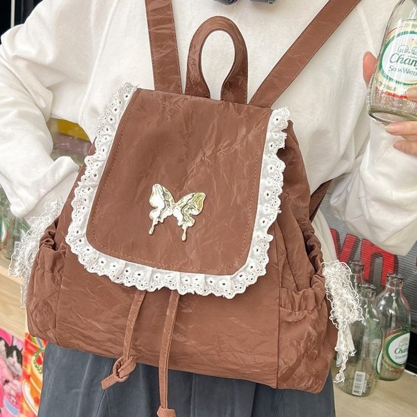 A new French lace pleated lace backpack for autumn and winter, a cute and unique butterfly drawstring backpack for young girls full figure