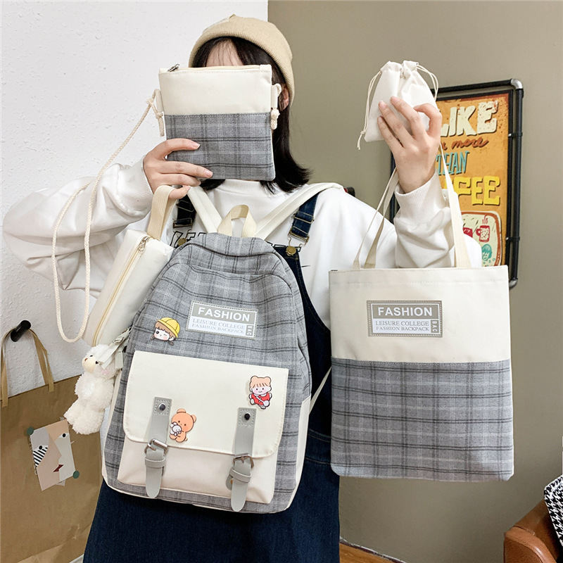 New cute checkered middle school schoolbag, girls' five-piece backpack, casual college students' canvas backpack, cross-border full figure