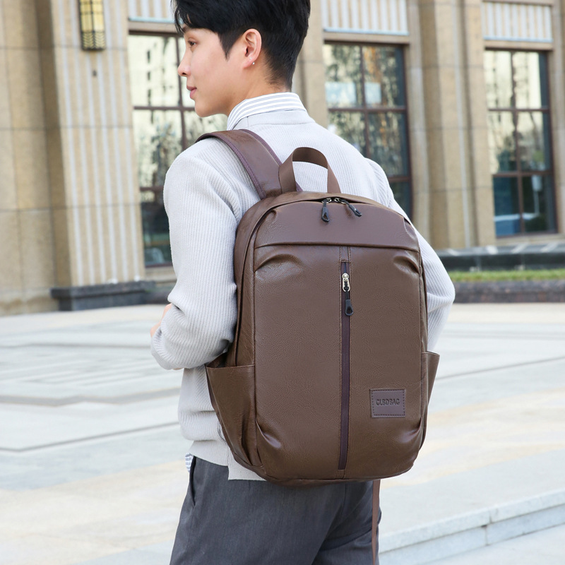 New business Korean-style backpack for junior and senior high school students, men's large-capacity, simple PU outdoor travel computer backpack details Picture