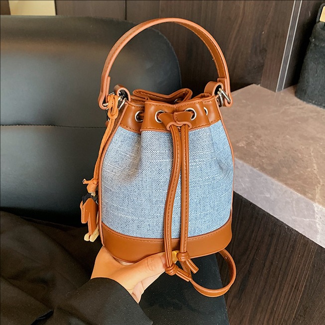 Cross-border fashion bucket bag 2025 new style niche single-shoulder bag drawstring crossbody bag High-end handbag for women full figure