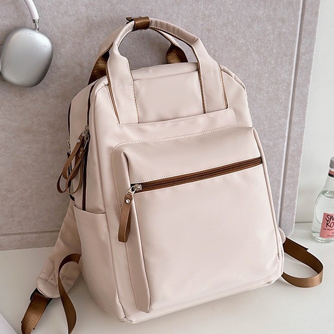 Japanese-style warm-colored commuter bags, large-capacity backpacks, backpacks, computer bags, men's and women's schoolbags, casual and fashionable travel bags Application Scenario