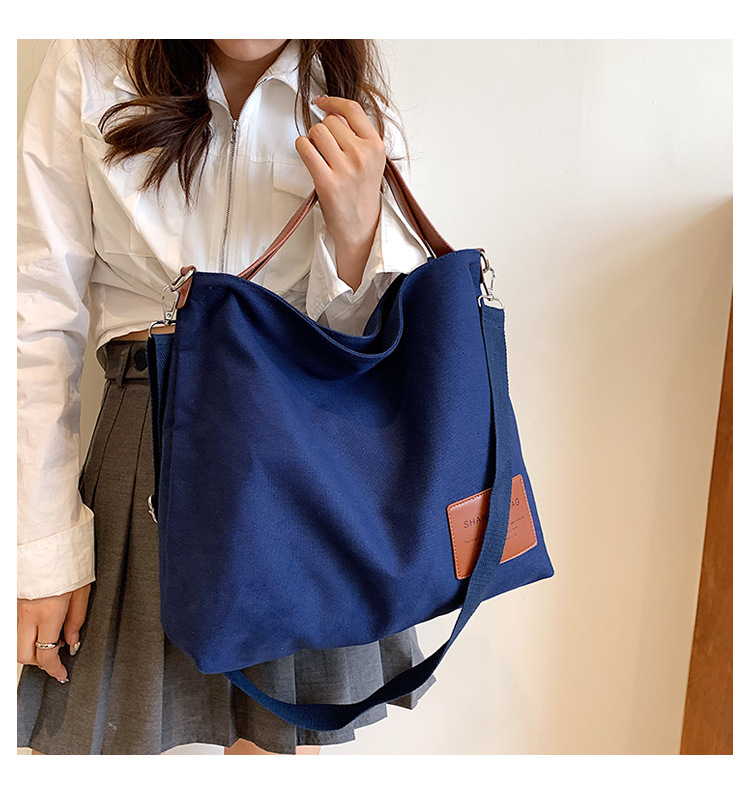 Canvas bag for women 2022 New large-capacity artistic single-shoulder bag, Korean-style hand-held commuter bag, simple tote bag for women full figure