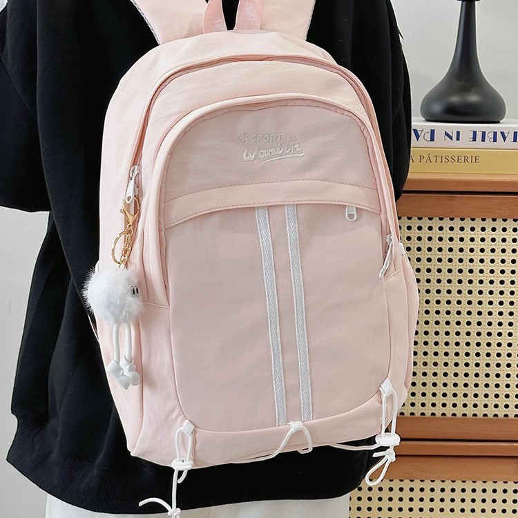 This fashionable and cute girlish backpack has a strong design sense. It is a large-capacity student backpack that reduces the burden. The color-blocking casual and versatile schoolbag Specification drawing