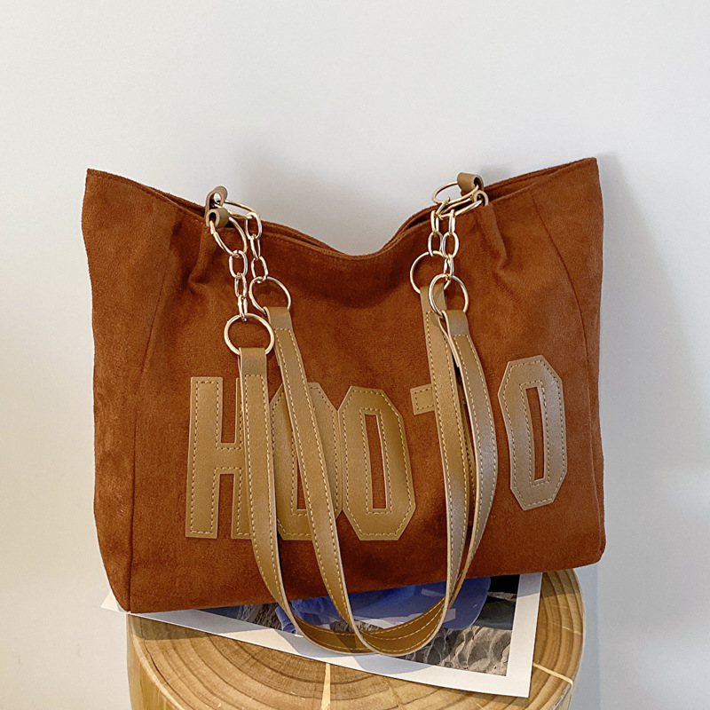 A large single-shoulder canvas bag for college students, a large-capacity women's 2022 new autumn commuter tote bag Application Scenario