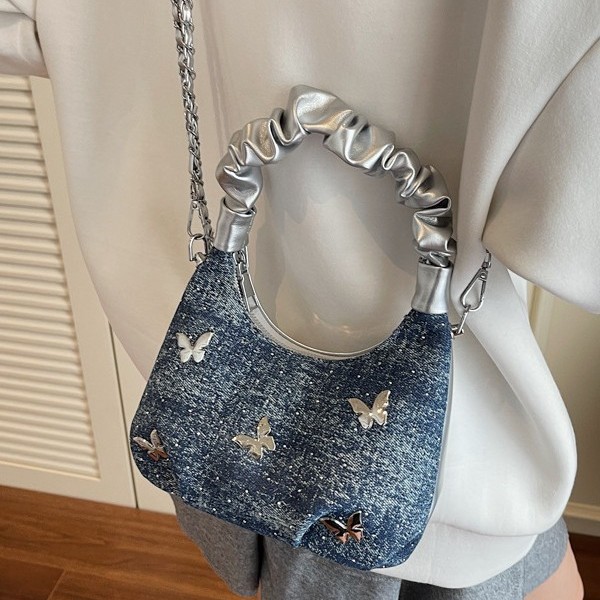 A new summer single-shoulder crossbody bag with a bow under the armpit, featuring a unique Korean texture silver bag full figure