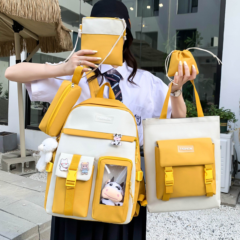 Japanese-style cute girl schoolbag, campus junior high school and senior high school students' backpack, large-capacity Korean version backpack five-piece set Application Scenario